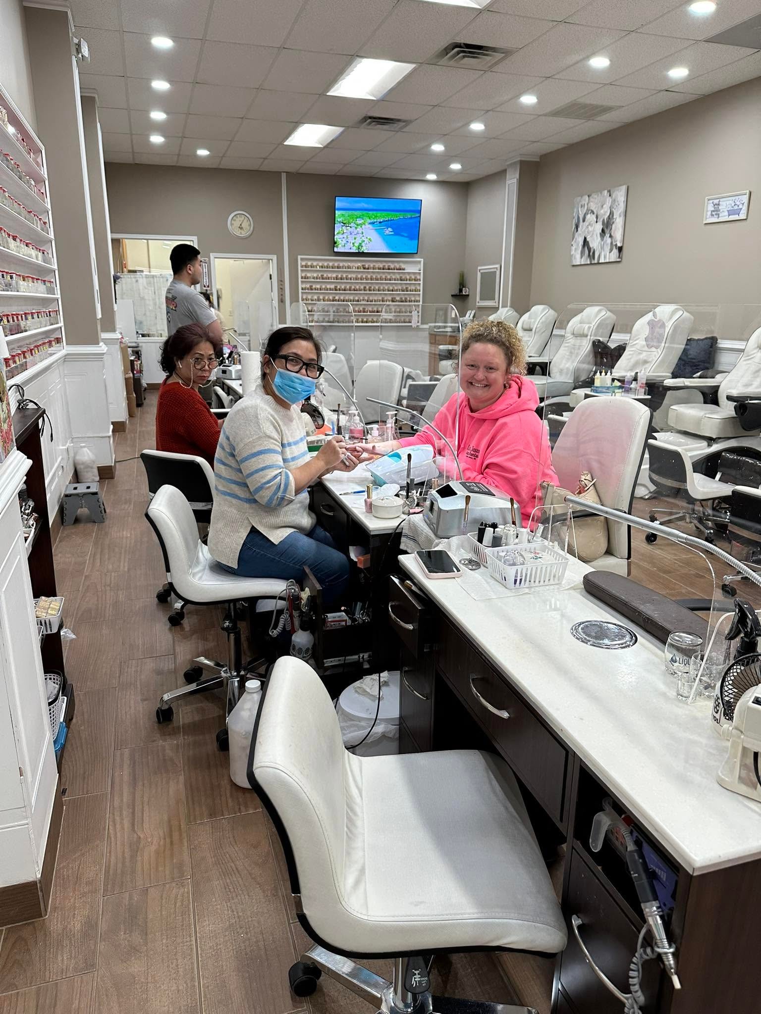 LaVie Nails technician caring for a guest at a manicure station — warm, attentive service in the Morganton NC salon